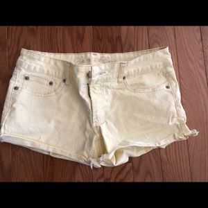 American Eagle Pale Yellow Jean Distressed Shorts